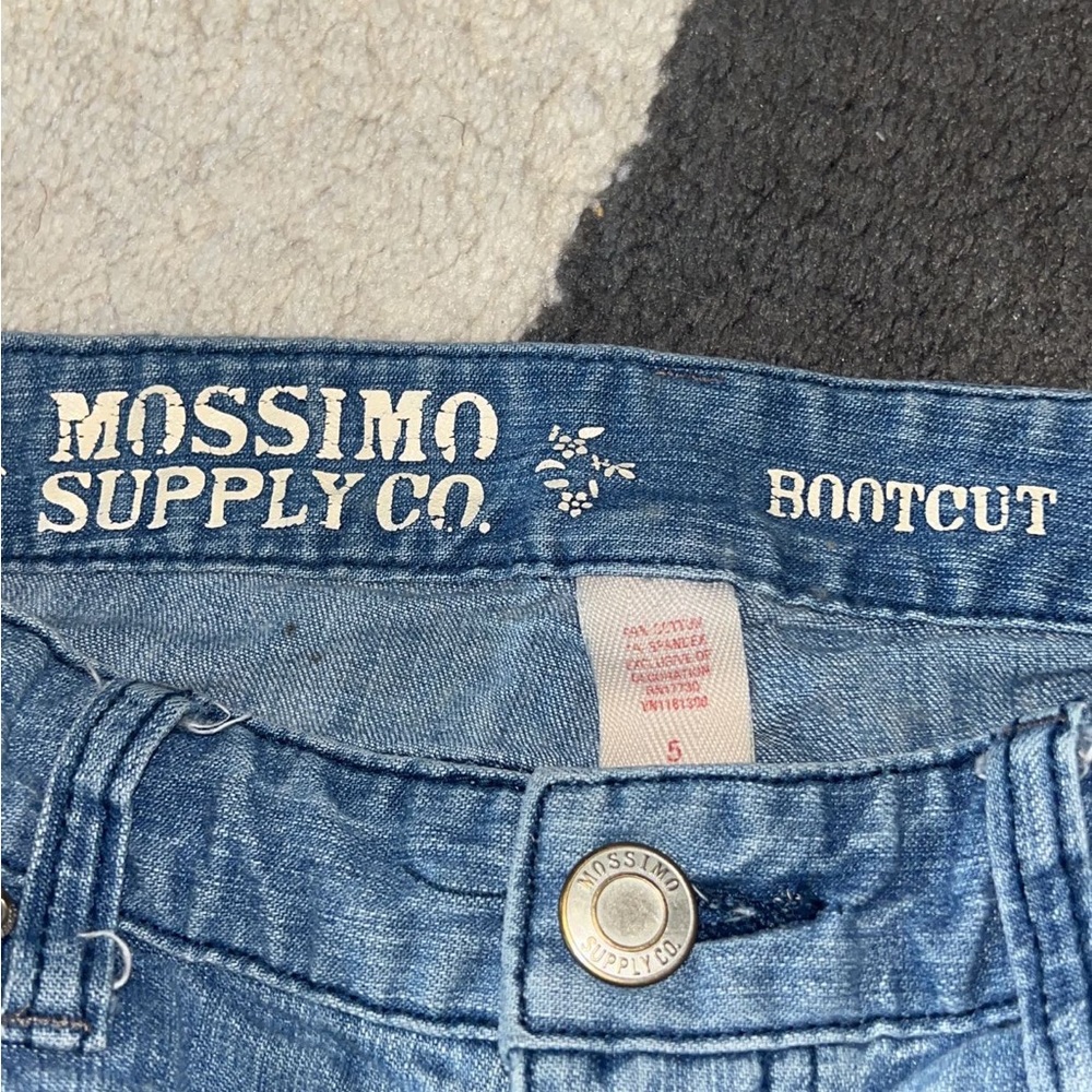 Light wash blue boot cut jeans